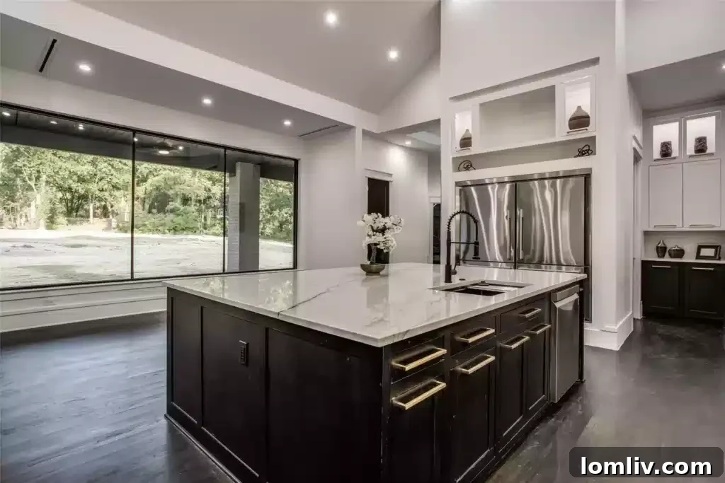 Contemporary kitchen design with dual islands and high-end appliances