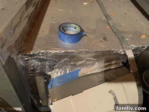 Blue Painter's Tape on an HVAC Duct