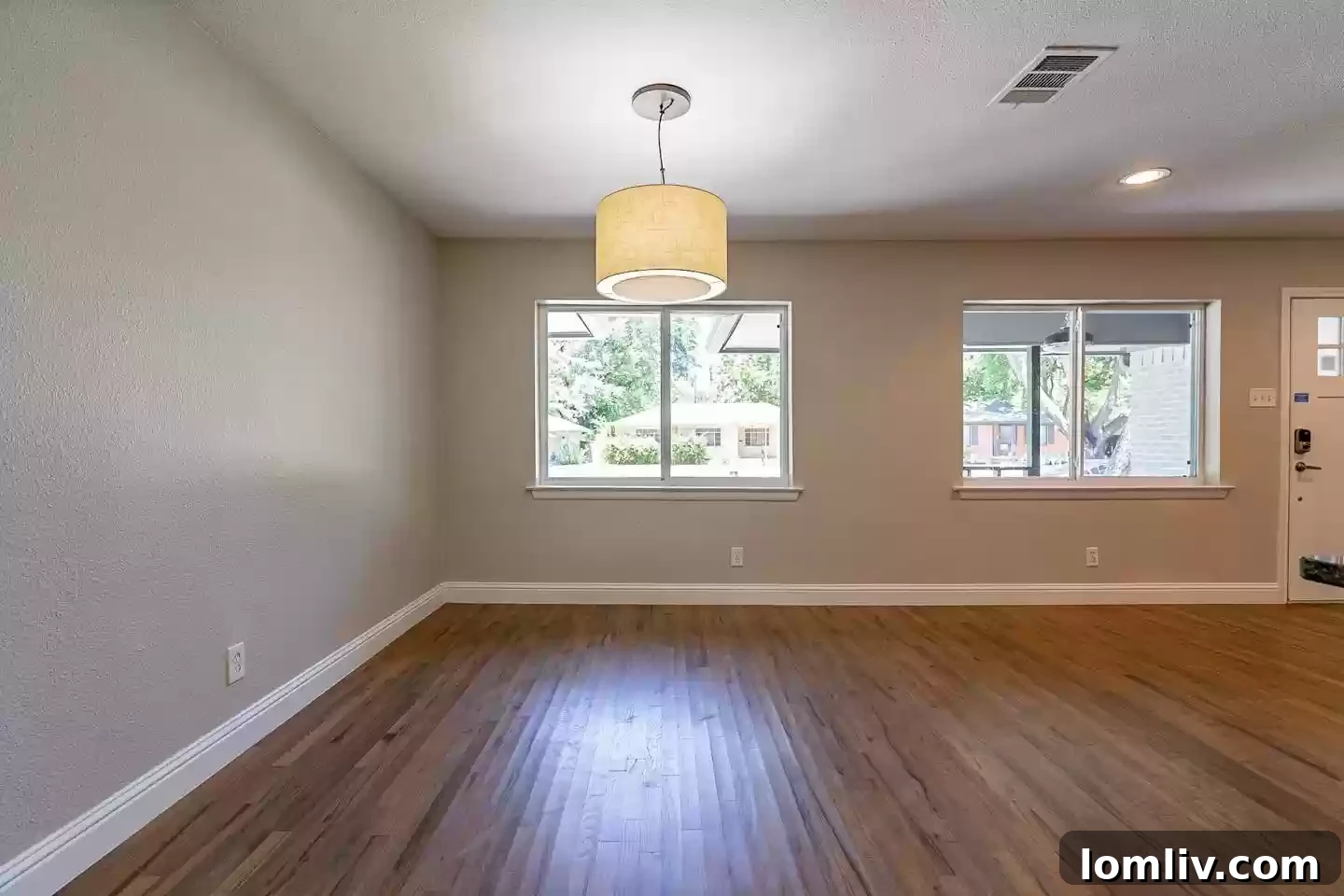 The vibrant front exterior of a recently updated home, reflecting the modern aesthetic increasingly popular in Casa View Haven renovations.