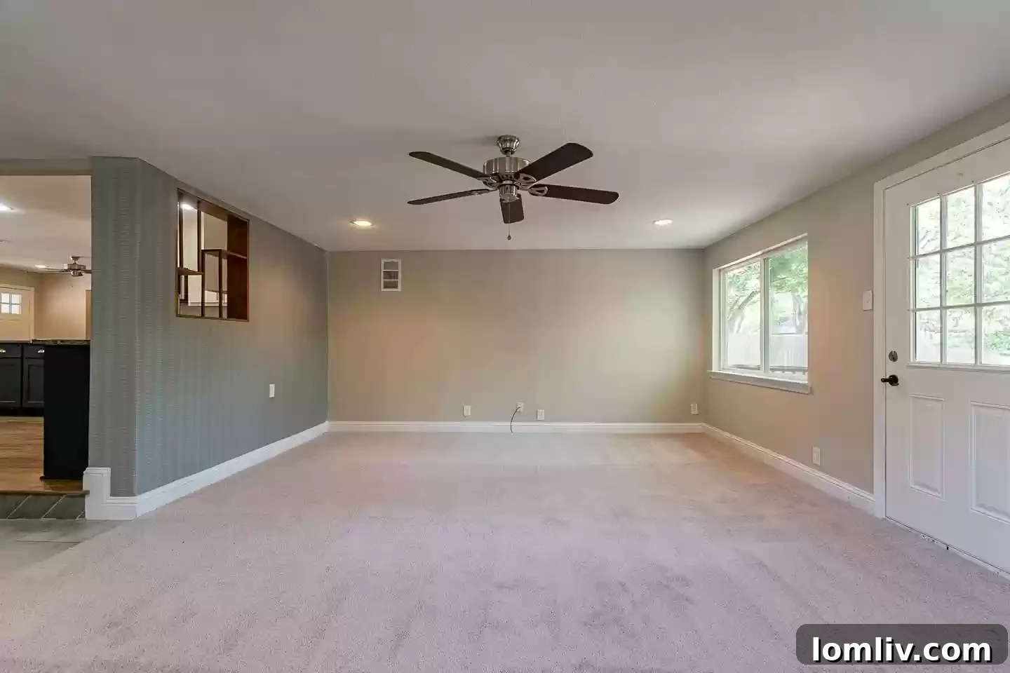 A bright and airy dining area, seamlessly connecting to the kitchen, illustrating the functional improvements made to homes in the neighborhood.