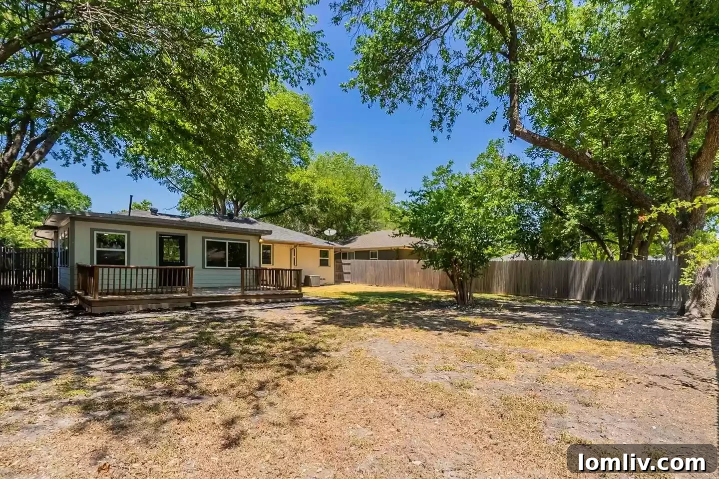 The tranquil backyard space, offering a private retreat for residents and adding significant value to renovated properties in Casa View Haven.