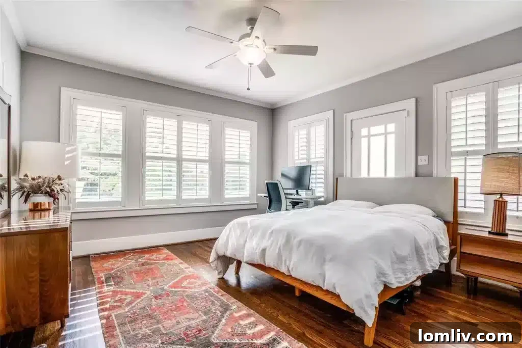 Spacious primary bedroom with flexible attached nursery or home office space, offering versatility and comfort.