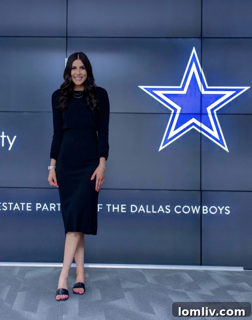 Caileigh Tuma working diligently at her desk, showcasing her focus.