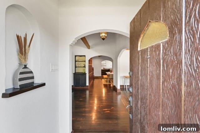Another perspective of the 2218 Carnes Street Tudor house, highlighting its charming facade and architectural character.