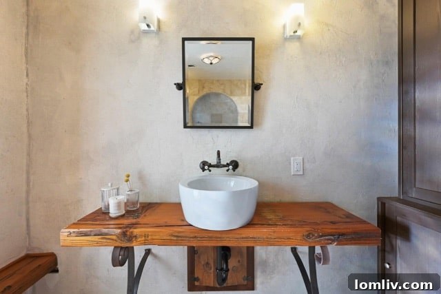 Luxurious primary bathroom at 2218 Carnes Street, featuring unique glass block details and high-end finishes.