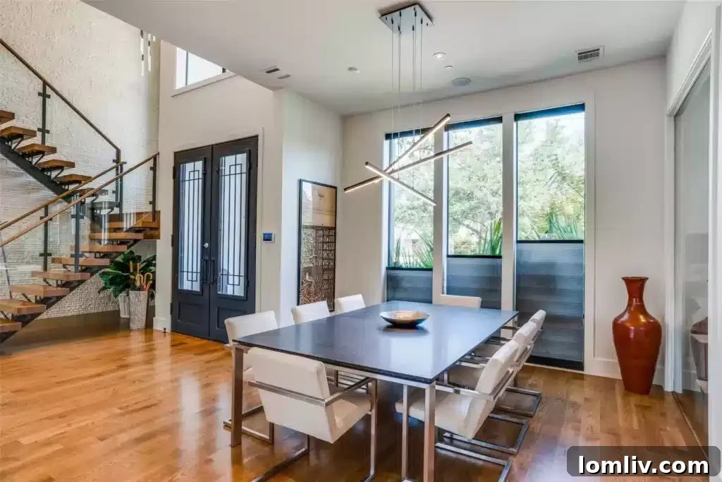 Spacious open-plan living area with high ceilings and abundant natural light