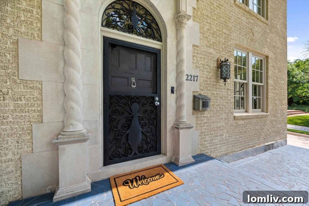 Elegant Mediterranean villa entrance with Solomonic columns in Park Hill