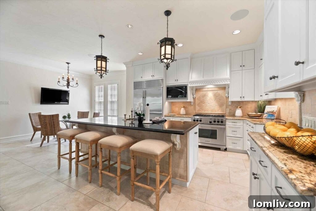 Modern eat-in kitchen with professional gas range and granite countertops