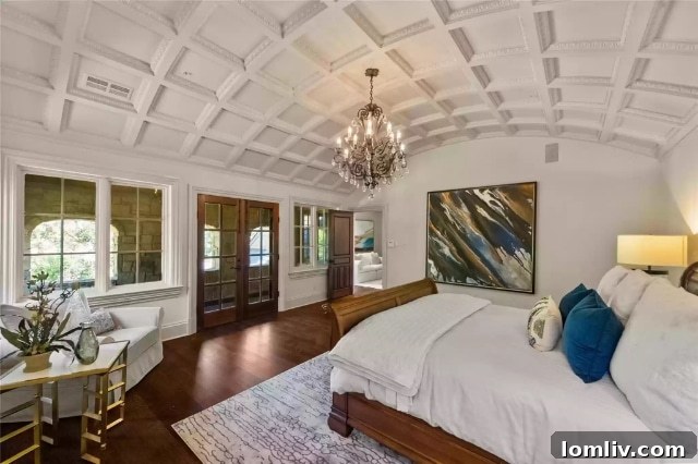 Luxurious barrel-vaulted primary suite with fireplace and sitting area