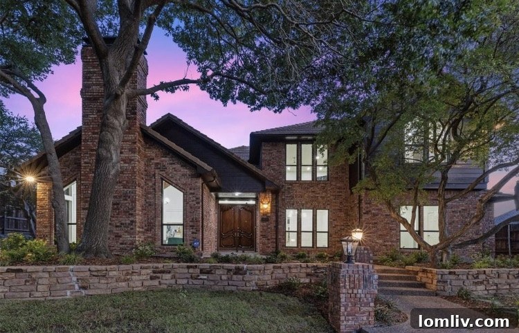 Grand exterior of a 3,877 sq ft family home at 5906 Edinburgh Ct in Plano's Briar Ridge Estates