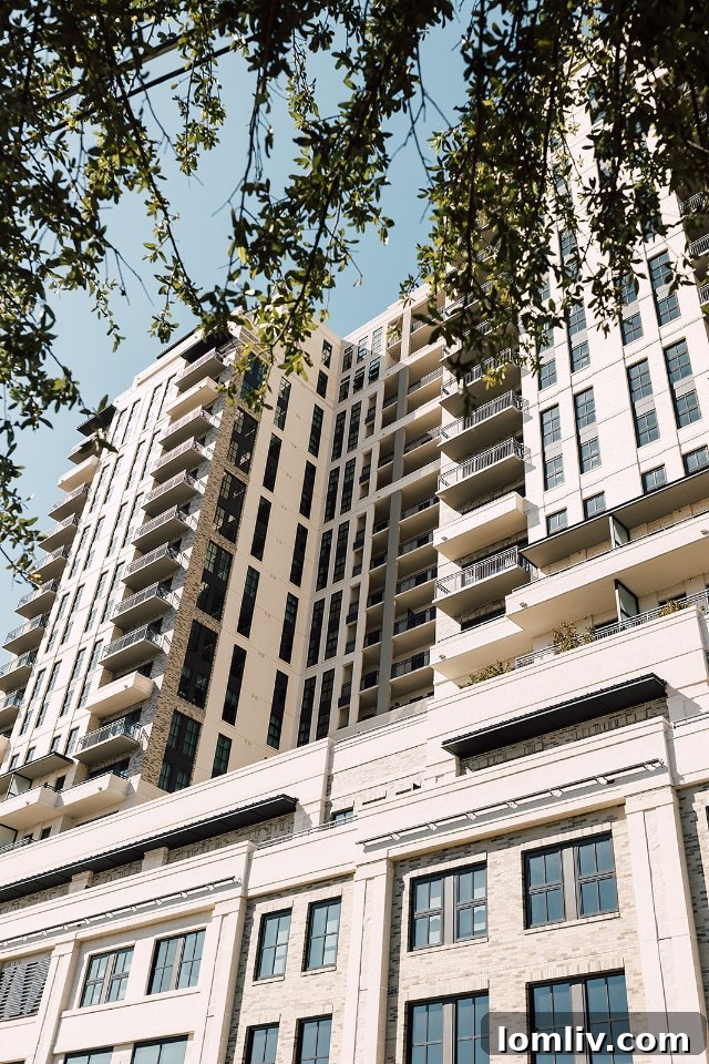 Elegant bathroom with modern fixtures and a large vanity at NOVEL Turtle Creek.