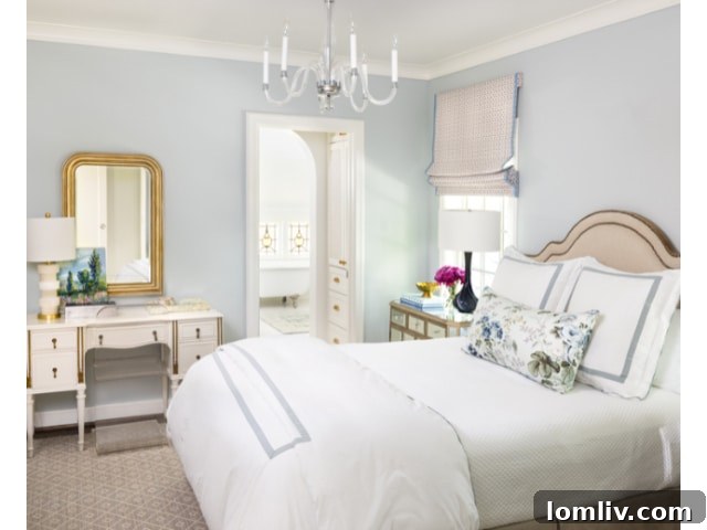 A serene nursery with a crib and gentle decor, situated thoughtfully under the charming angles of the roof.