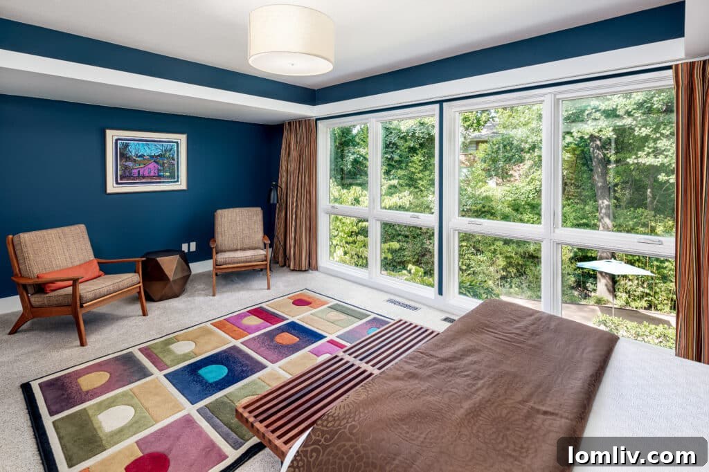 Spacious living area with fireplace and period furniture