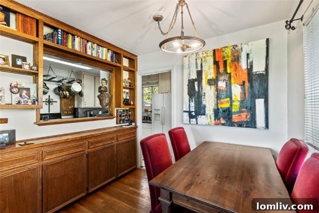The charming exterior of a cottage in a tree-lined Dallas neighborhood.