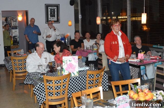 Close-up of guests celebrating at Jan McFarlane's birthday.