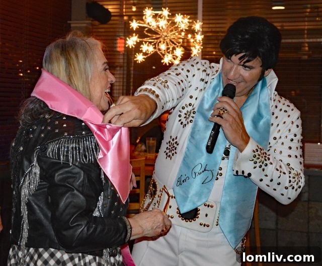 Jan McFarlane enjoying the Elvis performance with guests.