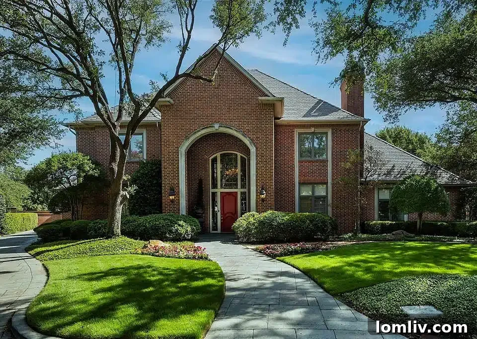 Stately exterior of 2 Manzano Circle, set on a large cul-de-sac lot in Los Arboles