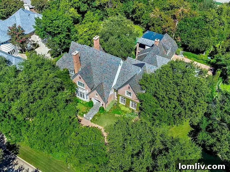 Spacious kitchen with wood cabinetry and island at 31 Robledo Drive