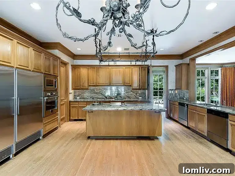 Formal dining room with chandelier and large windows at 31 Robledo Drive