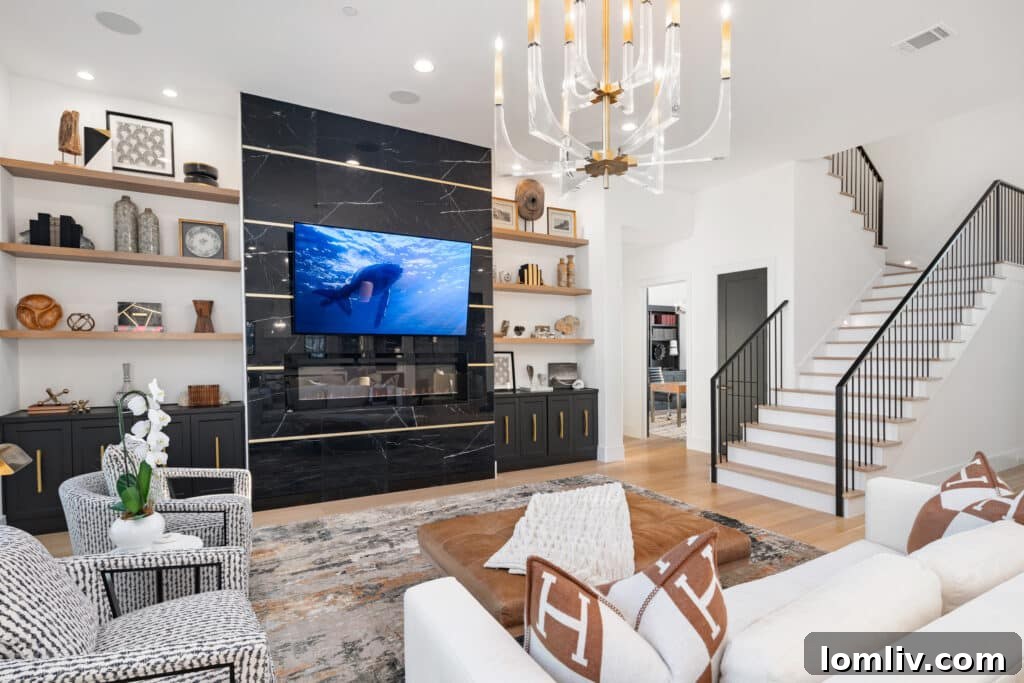 Elegant living room with fireplace and large windows, custom home interior
