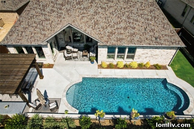 Outdoor communal spaces within Canyon Falls, featuring comfortable seating and manicured landscaping.