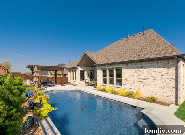 Exterior facade of a modern luxury home at 11705 Little Elm Creek Road in Canyon Falls.