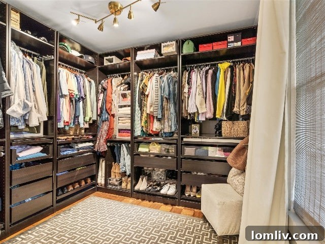 Customized walk-in closet in the primary bedroom