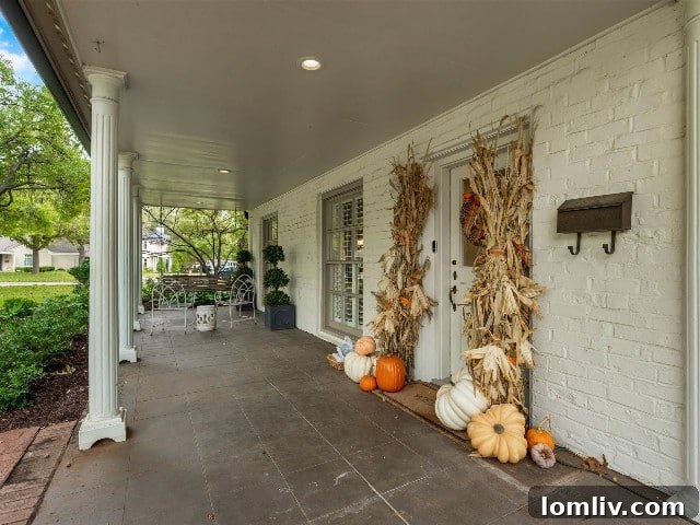 Elegant front porch of the historic Ridglea North home