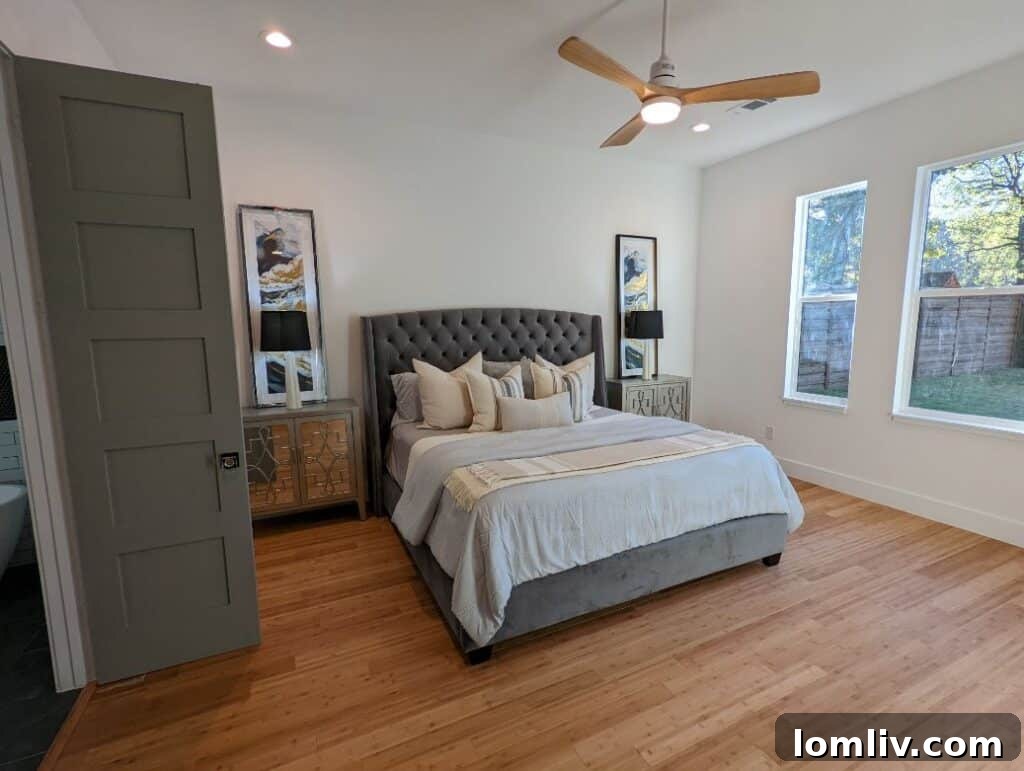 Detail of the modern facade and landscaping of the completed 1300 Francis Street residence in Carrollton