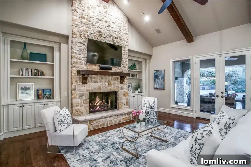 The Generational Gift: Multi-Gen Living for All 6 Stunning kitchen and dining area in the 7022 S. Janmar Drive luxury home.