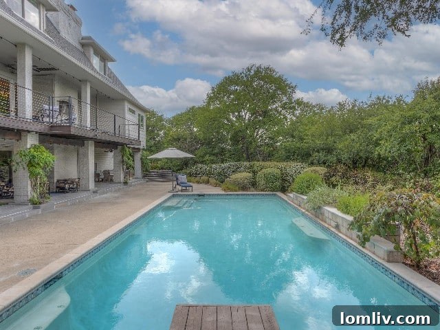 Luxurious and private swimming pool area of a Fort Worth luxury home