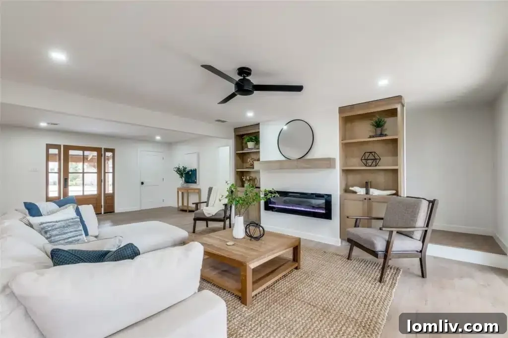 Lake Highlands Reinvented 6 Elegant Living Room with Built-ins and Fireplace