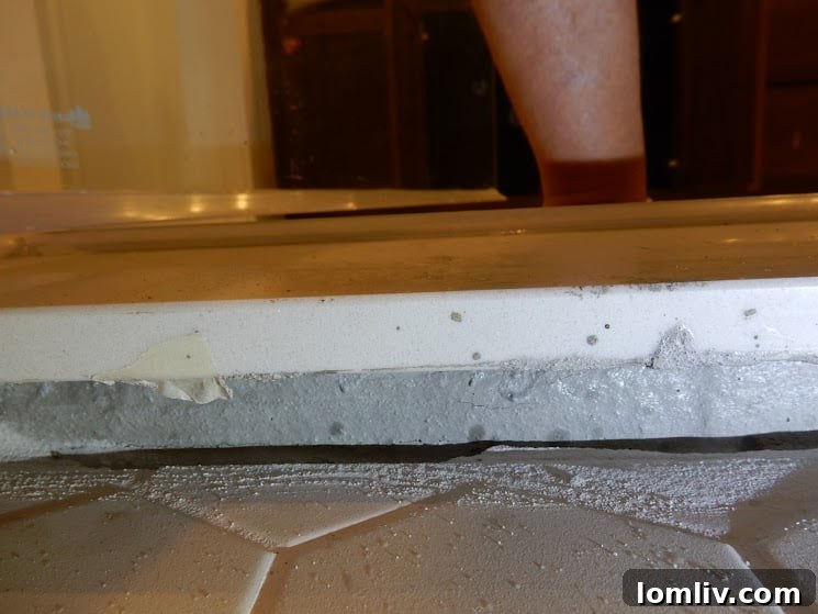 Unfinished shower threshold in new construction