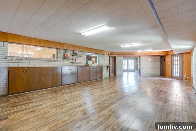 Stylish Mid-Century Modern enclosed patio with large windows