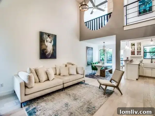 6 Home Design Features We Love You'll Want to Try 6 Circular landing window with custom curved railing offering a unique view