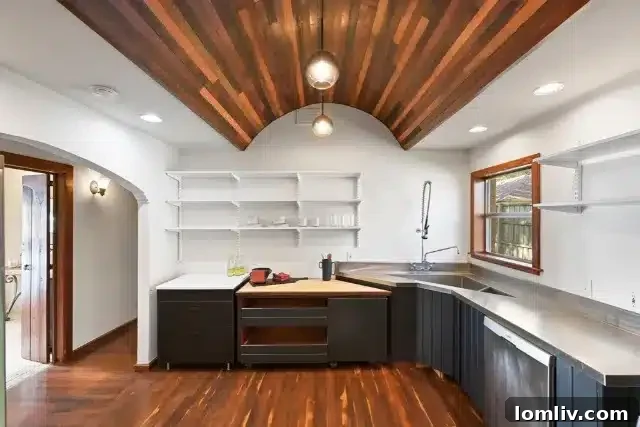 6 Home Design Features We Love You'll Want to Try 7 Custom triangle stainless steel sink beneath plank-lined barrel-vaulted ceilings