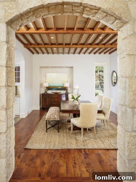 Elegant dining room with unique wood beam ceiling