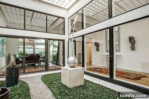 Million-Dollar Living: Howard Rachofsky's Home Awaits for $1,050,000 8 6406 Forest Creek - Serene Art Atrium