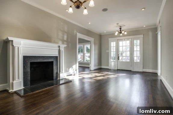 Bright and airy living room at 411 Montclair Ave with fireplace and hardwood floors