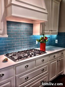 Tiffany Diederich's beautifully renovated kitchen with new cabinets and turquoise subway tile