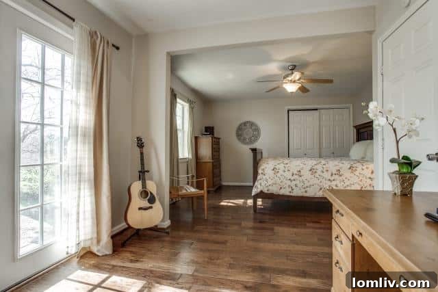 Master Bedroom Sitting Area with French Doors to Backyard