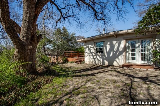 Spacious Backyard with Mature Trees at 943 Bridget