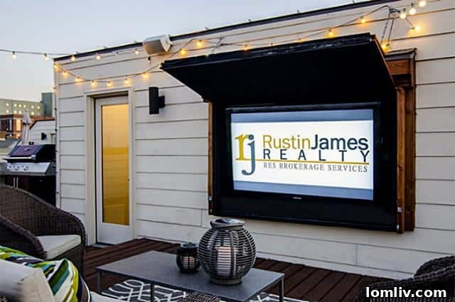 Real estate agent Rustin James Smith standing outside 2411 Hall Street brownstone