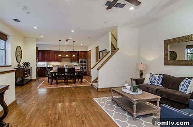 Spacious living room with large windows at 2411 Hall Street
