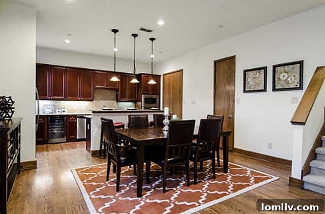 Modern dining area adjacent to kitchen at 2411 Hall Street