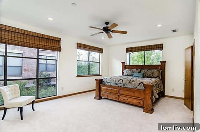 Luxurious master bedroom with abundant natural light at 2411 Hall Street