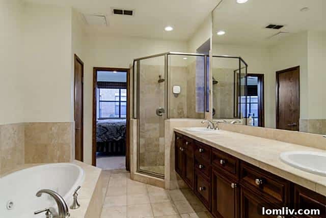Spa-like master bathroom with dual vanities at 2411 Hall Street