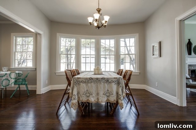 Kitchen view with white cabinets and granite counters