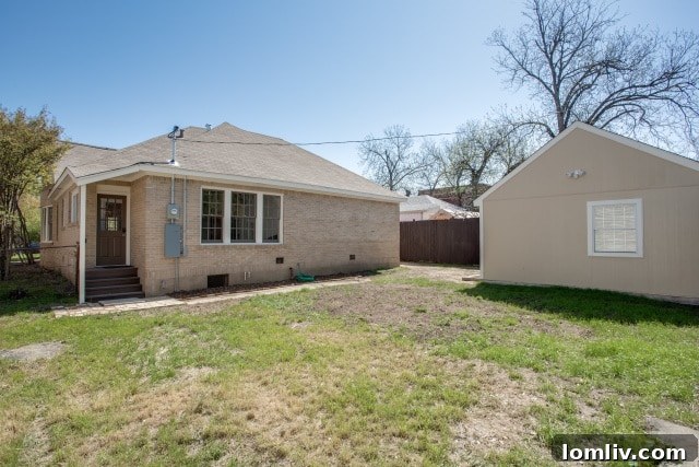 Backyard view of 707 Skillman Street