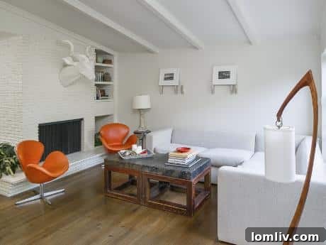 6806 Vada Drive - Living Room - Bright and airy space with modern furnishings and a view of the backyard.